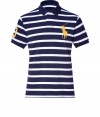 Stylish polo shirt in fine, navy blue and white striped pique cotton - A modern riff on a venerable classic from Ralph Lauren - Slim, straight cut - Small collar and short button placket - Oversize polo pony logo at chest and numbered sleeve - Hem hangs slightly longer in the back - Casually cool, ideal for everyday leisure - Pair with jeans, chinos or shorts