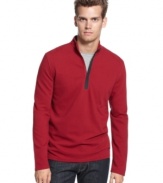 This quarter-zip sweater from Calvin Klein takes your layered look to the next level of style.