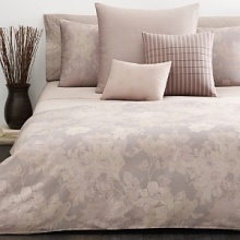 this collection offers duvet cover, comforter and shams featuring a beautifully collaged garden floral pattern overlapping in earthy shades.