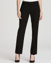 Sleek tailoring and classic styling make these Elie Tahari pants the foundation to your workweek style. Lengthen the slim silhouette with pointy-toe pumps.