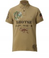 An edgy take on the classic polo, this bold top from Polo Ralph Lauren features embroidered detailing and an asymmetric hem - Spread collar, front button half placket, symbol detailing on shoulder, embroidered dragon patch on chest, front graphic, asymmetrical hem with side rivets - Style with straight leg jeans, trainers, and a leather jacket