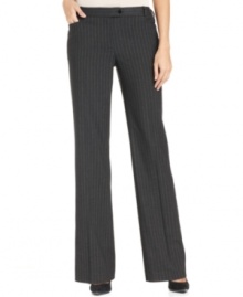 Menswear-inspired pinstripes get a fluid, feminine makeover from the master of minimalism, Calvin Klein.