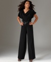 This breezy, well-draped jumpsuit by AGB features a relaxed stretch fit, a tall inseam and a nipped-in belted waist for a feminine silhouette.