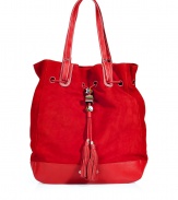 Inject sophisticated style to your daytime look with this versatile suede bag from Juicy Couture -Bucket style, drawstring with charm and tassel detail, leather carrying handles and bottom, back welt pocket - Style with your favorite everyday basics