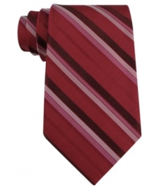 Classic stripes get down to business on this handsome silk tie from Calvin Klein.