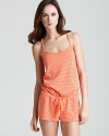 A soft silk chiffon romper in a stylish tonal stripe print.