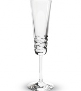 Classic technique, modern beauty. Crafted of fine Baccarat crystal, the Lola champagne flutes pair horizontal wedge cuts with a simply luminous base. The silhouettes of the toasting flutes in this collection radiate grace and sophistication.