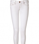 Add these bright white skinnies to your look for maximum style - Classic five-pocket styling, slim fit, cropped, logo-detailed back pockets - Style with a relaxed top, a leather jacket, and wedge booties