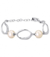 Understated elegance. This bracelet from Majorica is crafted from sterling silver with organic man-made pearls (10/12 mm) added for classic appeal. Approximate length: 7-1/2 inches.