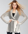 The bold patterns on INC's cardigan lend a graphic look to a classic piece. A scalloped adds feminine polish.