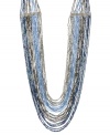 Go to great lengths. Kenneth Cole New York's striking long necklace is elaborately embellished with blue and silver bugle bead strands. Set in hematite tone mixed metal. Approximate length: 32 inches.