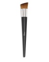 Designed for applying fluid and cream foundations, this stunning brush has a dense, beveled head, allowing you to work with more makeup and blend it perfectly into the skin, for results that combine a natural look with perfect coverage. The brush's skillfully tapered synthetic hairs offer the soft touch of natural hairs and polish the foundation for maximum radiance. Made in France. 