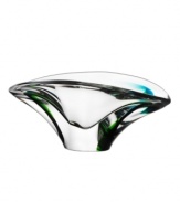 A dream-provoking piece. Masterfully crafted from delicate crystal, this striking bowl with hints of luminous green catches the eye and adds a whimsical accent to your tranquil space. Beautiful harmony flows from the soft edges and defined shape of this peaceful addition.