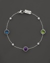 Stations of diamonds and brilliant gemstones dot a sterling silver chain. By Ippolita.