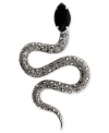 Quite striking. Judith Jack's brooch is crafted from sterling silver with marcasite (9/10 ct. t.w.) and onyx (2-7/10 ct. t.w.) adding a bold touch to the snake motif. Approximate length: 3 inches.