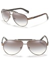 Represent summer chic in Prada's metal aviator sunglasses with a well stated top bar and tortoise arms.