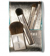 Perfectly packable in a metallic, faux-leather case-- whether you're headed out of town or just a night on the town, our Mini Brush Set features full-sized brush heads in a new slimline design for a flawless finish wherever you go. Set includes: Four brushes: Blush, Eye Sweep, Angle Eye Shadow, and Ultra Fine Eye Liner all in a compact case. There's a handy compartment in the case designed to hold our Desert Twilight Eye Palette, too.