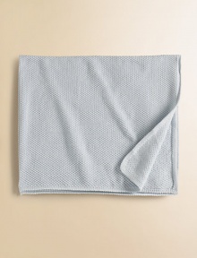 A warm knit blanket in soft cotton is best for sleeping baby. Cotton; machine wash Imported