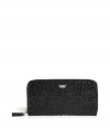 Add instant luxe to the everyday with this woven leather wallet from cult favorite Anya Hindmarch - Classic rectangular shape, top zip closure, front log detail, inside card slots and bill fold - Perfect for everyday use or as a thoughtful gift