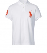 Detailed in breathable and durable cotton mesh, Ralph Laurens big pony polo is a cool modern take on this classic cut style - Small collar, button placket, short sleeves, oversized embroidered polo player at chest, number patch on sleeve, slit sides, high-low hemline - Classic fit - Wear with everything from jeans and sneakers to colored cords and loafers