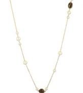 Long and luxurious. This beautiful 42-inch necklace combines petite stations of cultured freshwater pearl (6-8 mm) and onyx (15-3/8 ct. t.w.). Delicate chain and setting crafted in 18k gold over sterling silver. Approximate length: 42 inches.