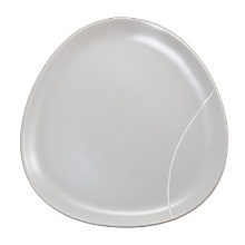 Simple, organic shapes are the foundation of this dinnerware and serveware collection. Stoneware.