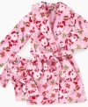 She and her bff doll can wrap themselves in merriment and joy in this soft robe set by Dollie & Me.