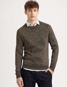 Elegant knit adds a sophisticated shimmer to a classic crewneck sweater.CrewneckRibbed knit collar, cuffs and hem91% wool/5% polyester/4% metallicDry cleanImported