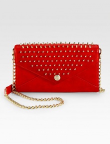 This leather style features a stud encrusted flap and a versatile detachable strap.Detachable chain and leather strap, 22 dropMagnetic snap flap closureStudded detailsOne outside open pocketOne inside zip pocketTwelve credit card slotsTwo bill compartmentsFully lined8W X 5H X 1DImported