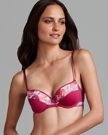 A floral print in rich autumn colors decorate a soft, supportive balconette bra from Calvin Klein.