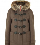 Taking inspiration from the classic toggle duffle coat, this modern take from Burberry Brit features a slim fit and a removable hood of extra versatility- Removable fur hood, concealed front button placket with toggle button closure, long sleeves with belted cuffs, slit pockets and large patch pockets, back vent - Style with slim jeans or corduroys and high heel booties