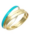 Decorate your wrists in style. Charter Club's chic bracelet set features three slip-on bangles in shiny gold tone mixed metal and polished turquoise resin. Wear them one at a time, or layer up to embrace the latest trend. Approximate diameter: 2-1/2 inches.