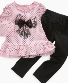 Dress her in spot-on style and comfort with this sweet polka-dot tunic and legging set from Nannette.