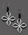 The perfect way to freshen up both evening wear or every day, these flower-shaped mixed metal earrings from Fossil add charm to any occasion. With a knotted black leather cord. Drop measures approximately 1-3/4 inches.