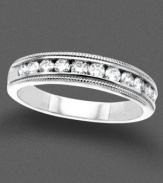 Striking style. Sparkling round-cut diamond (1/2 ct. t.w.) lie in a row in an etched setting of 14k white gold.