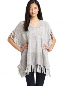 THE LOOKAllover knit crochet constructionSubtle floral designShort sleevesFringe detailPullover styleTHE FITAbout 37 from shoulder to hemTHE MATERIAL55% cotton/45% acrylicCARE & ORIGINDry cleanImportedModel shown is 5'10 (177cm) wearing US size Small. 