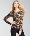 INC dresses up this petite sweater with a striking animal print and a brilliant beaded collar for a super luxe look.