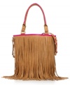 Care-free and unconventional, this fun fringe satchel by Steve Madden pays homage to the '70s Haight-Ashbury hippie-chic. Braided handle detail and matching crossbody strap offer convenience and cool, while interior cell phone and PDA pockets keep modern devices secure.