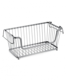 Everything in its place. Add some industrial edge to your space with this chrome basket, which features an open design for easy access to your belongings. Convenient folding handles are great for moving from room to room or folding in to create a tower of stacked baskets.