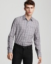 A muted, tonal check brings a quiet elegance to this casual slim fit sport shirt from John Varvatos.