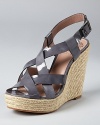 In a unique hue dubbed overcast (somewhere between blue and grey), these covetable wedges offer summer style with mysterious, moody edge. From VINCE CAMUTO.