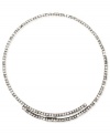 Sleek and stylish. Nine West's coil collar necklace is crafted from silver-tone mixed metal with glass crystal stones adding a sparkling element. Approximate length: 16 inches.