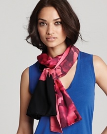 You'll reach for this elegant Charlotte Sparre scarf again and again, with a subtle yet striking peony print. It's the perfect way to break up basic black.