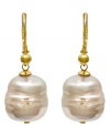 From the island of Mallorca, Spain, these white baroque organic man-made pearl (12 mm) drop earrings are set in 18k gold over sterling silver and feature a 14k gold post. Approximate drop: 1/2 inch.