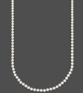 Timeless elegance in polished pearls by Belle de Mer. Capture elegance with AA Akoya cultured pearls (6-6-1/2 mm) set in 14k gold. Approximate length: 24 inches.