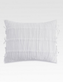 Make your bed especially inviting with this feather-filled, pure white pillow soften with shirring and side ties.16 X 20Feather fillingCottonMachine wash coverImported