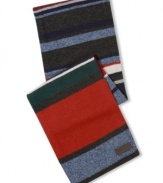 Tuned to this season's style wavelength: A patterned muffler from Tommy Hilfiger knit in a fine-gauge nylon/wool knit.