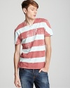 Throw it on with khakis or rock it under a sport coat -- this faded stripe tee is all about freedom.