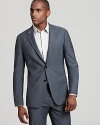 A slate gray wool-blend sport coat from Theory features a classic cut with modern appeal.