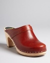 Instantly slip into style with retro-meets-now Sweedish Hasbeens wooden clogs.